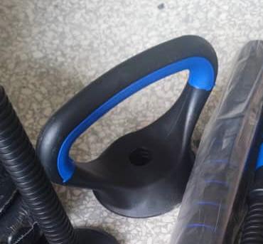 Kit Mancuernas 20KG 8 Discos +Manc. Rusa